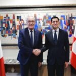 Mexico's Minister of Foreign Affairs and President of Switzerland shaking hands