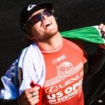 Alan Cleland, proudly displaying the Mexican flag after a surfing victory.