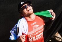 Alan Cleland, proudly displaying the Mexican flag after a surfing victory.
