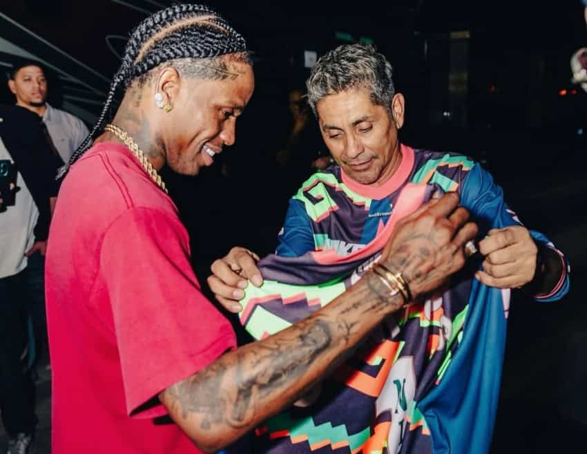 Travis Scott and Jorge Campos admiring the jersey design on which they collaborated