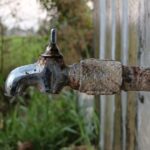 rusted tap slowly dripping