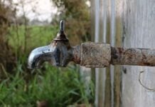 rusted tap slowly dripping