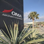 An OMA sign at the entrance of Monterrey airport