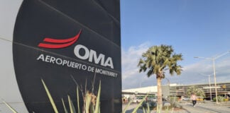 An OMA sign at the entrance of Monterrey airport