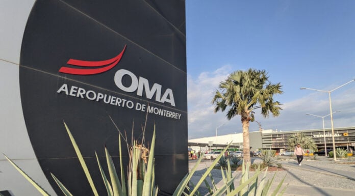 An OMA sign at the entrance of Monterrey airport