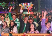 Fans celebrate a goal against Ecuador on Tuesday at the Zócalo fan festival in Mexico City.