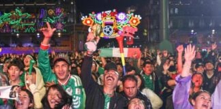 Fans celebrate a goal against Ecuador on Tuesday at the Zócalo fan festival in Mexico City.