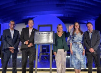 Chihuahua governor presenting at the opening of Embraer factory in the state
