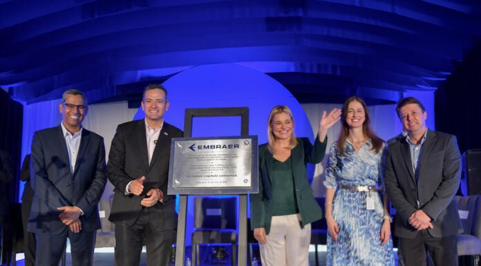 Chihuahua governor presenting at the opening of Embraer factory in the state
