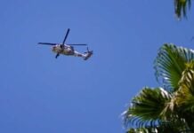 helicopters flying overhead near the State Attorney General’s Office in Mexicali on Tuesday, following an alert issued by the United States