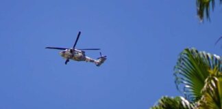 helicopters flying overhead near the State Attorney General’s Office in Mexicali on Tuesday, following an alert issued by the United States