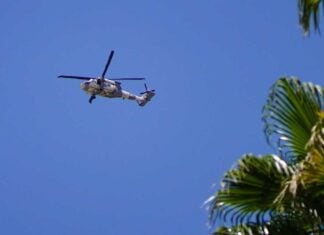 helicopters flying overhead near the State Attorney General’s Office in Mexicali on Tuesday, following an alert issued by the United States