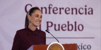 President Claudia Sheinbaum at the podium of her August 7 mañanera