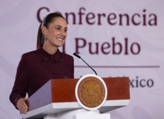 President Claudia Sheinbaum at the podium of her August 7 mañanera