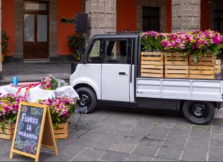 The Olinia Carga electric vehicle, filled with flowers