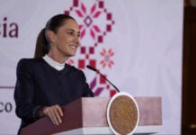 President Sheinbaum at the podium of her August 13 mañanera press conference