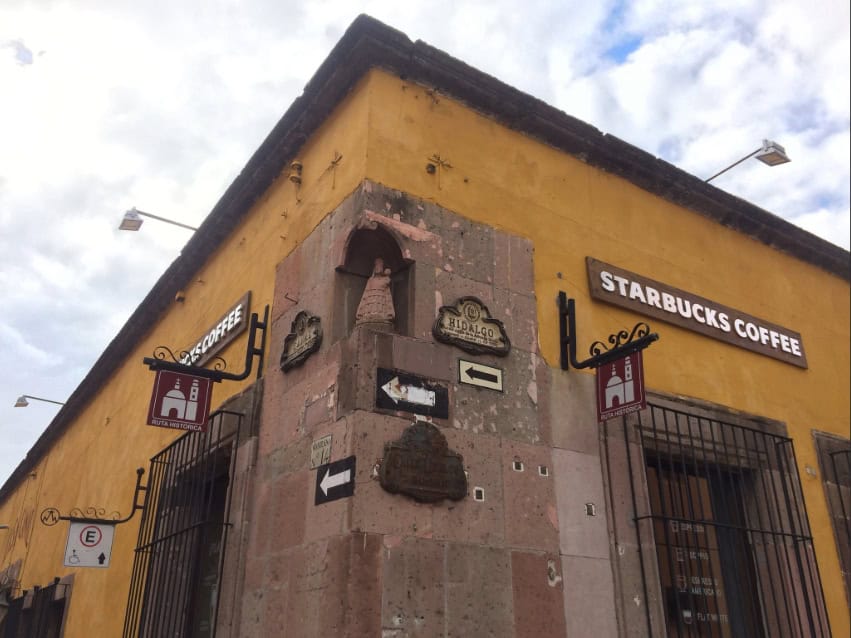 The colonial stone facade of the San Miguel de Allende Starbucks