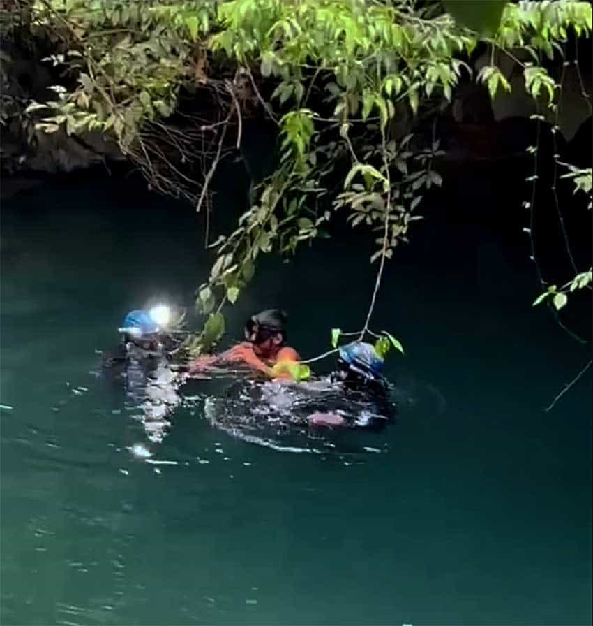 Three men in a river