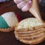 A pastry chef puts the finishing touch on patriotic sweet bread.