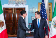 Foreign Minister Roberto Velasco shakes hands with US Secretary of State Marco Rubio