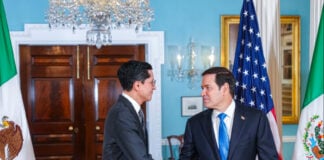 Foreign Minister Roberto Velasco shakes hands with US Secretary of State Marco Rubio