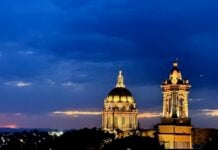 Summer evenings in San Miguel highlight church towers and other historic buildings backed by lingering sunsets.