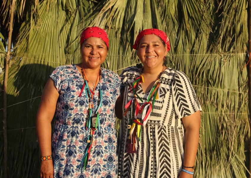 Melina Maldonado Sandoval, left, and Claudia Susana Quintero wear the red headscarves traditionally worn by Yoreme men and women.