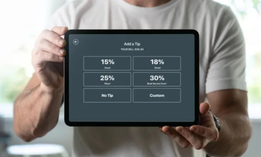 Digital screen showing tipping options