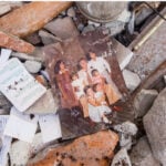 A family photo lies in rubble following an earthquake in Mexico.