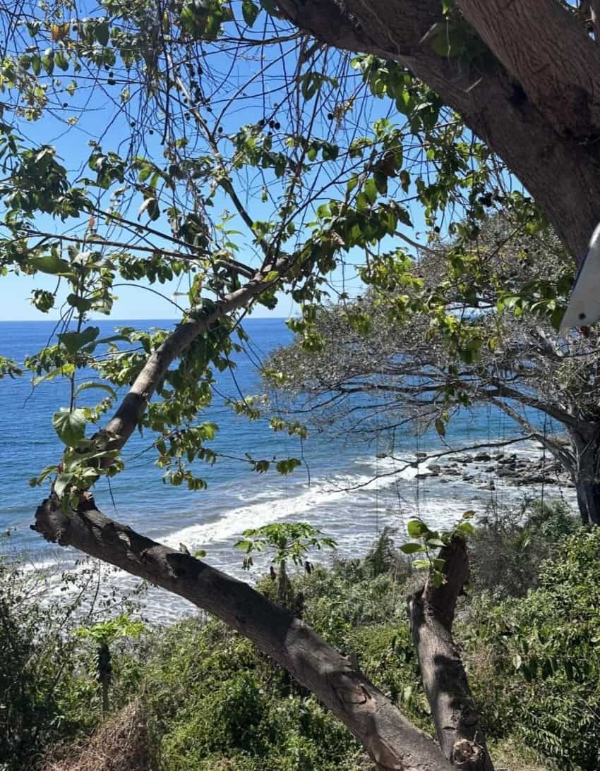Pacific Ocean from the back of a motorcycle in a Jalisco
