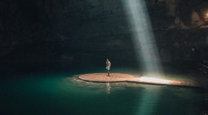 Man in a cenote in