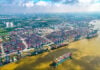 Aerial view of cargo ships docked at Cat Lai terminal in Ho Chi Minh City, Vietnam's busiest port.