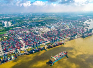 Aerial view of cargo ships docked at Cat Lai terminal in Ho Chi Minh City, Vietnam's busiest port.