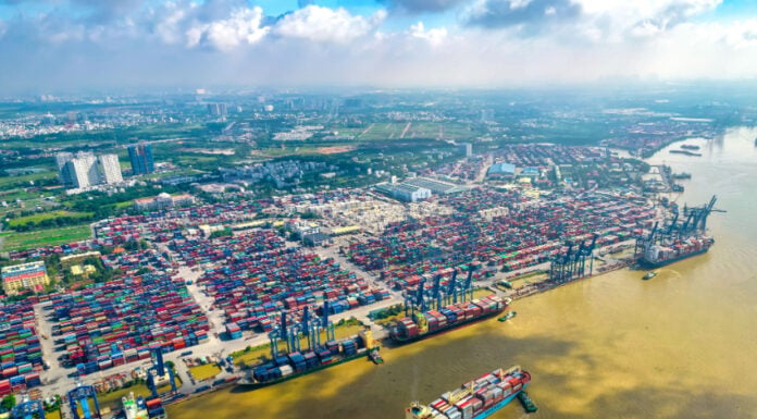 Aerial view of cargo ships docked at Cat Lai terminal in Ho Chi Minh City, Vietnam's busiest port.