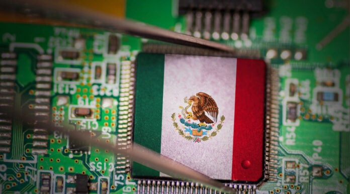 A CPU computer chip with a Mexican flag