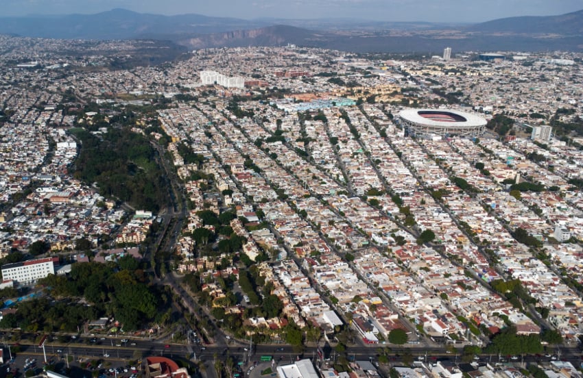 Urbanization in northern Guadalajara halted in the background by the Barranca de Huentitán