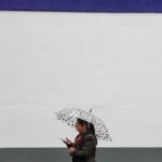 person walking with an umbrella