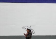 person walking with an umbrella