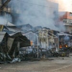Burned and smoking stalls at Acapulco's Central Market