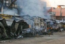 Burned and smoking stalls at Acapulco's Central Market