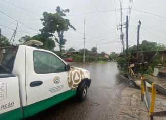A Civil Protection vehicle drives through the rains of Hurricane Polo in Morelia, Michoacan