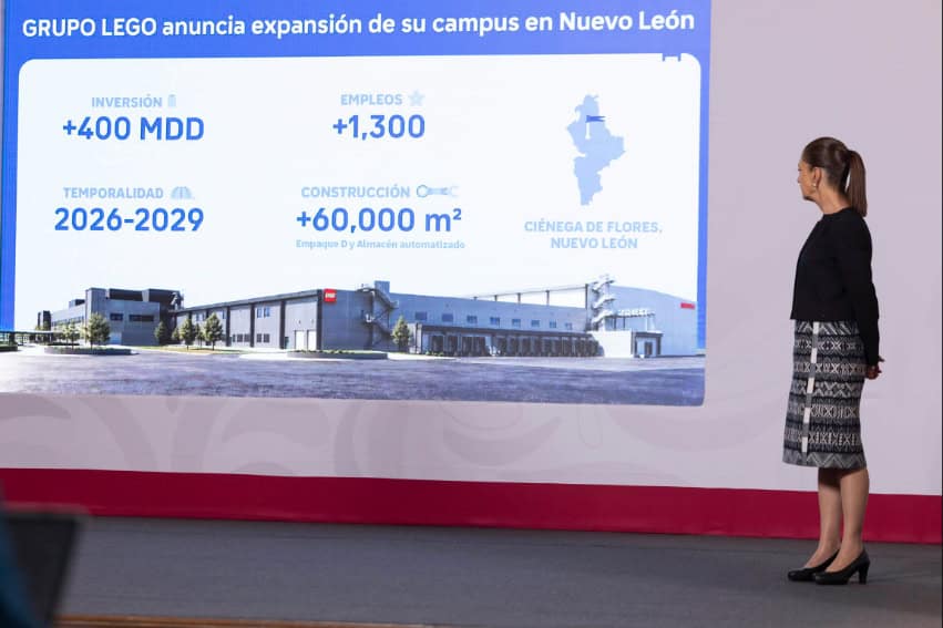 Sheinbaum looks at a slide showing job creation projections for the new Lego facilities in Nuevo León, during her September 24 mañanera press conference.