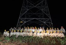 CFE workers in front of power line