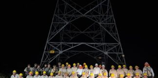 CFE workers in front of power line