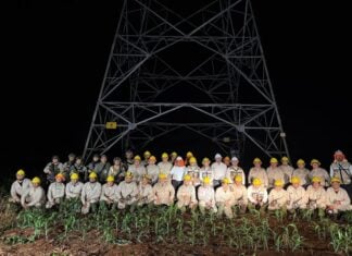 CFE workers in front of power line