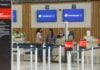 Passengers check in for a flight at the Aeroméxico ticket counter at Felipe Ángeles International Airport (AIFA).
