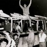 Student protesters on a burned bus in July 1968 in Mexico City