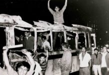 Student protesters on a burned bus in July 1968 in Mexico City