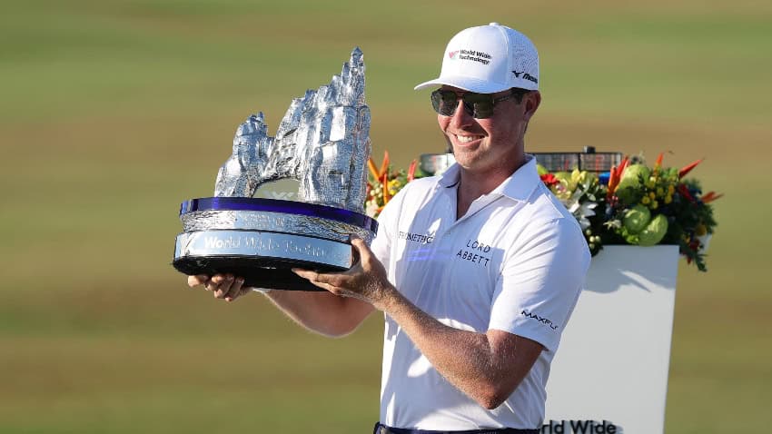 Ben Griffin holding the trophy for the 2025 World Wide Technology Championship, a PGA event held in Cabo San Lucas