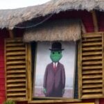 A senor frog on a sign in Cancun.